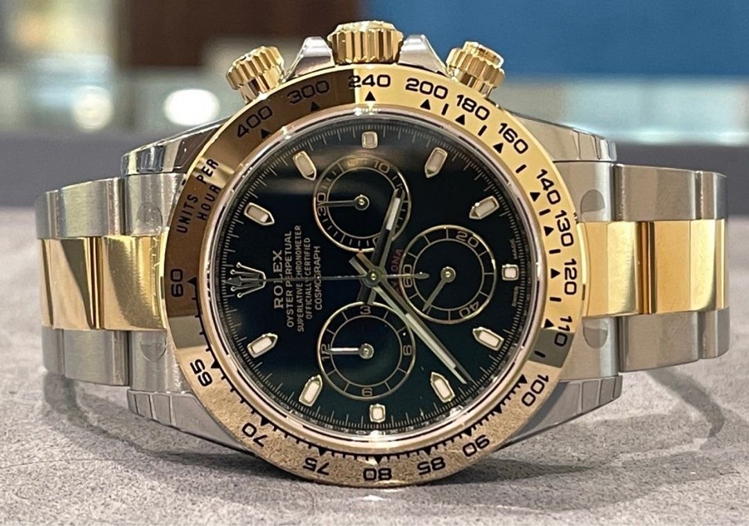 Rolex half clearance gold daytona